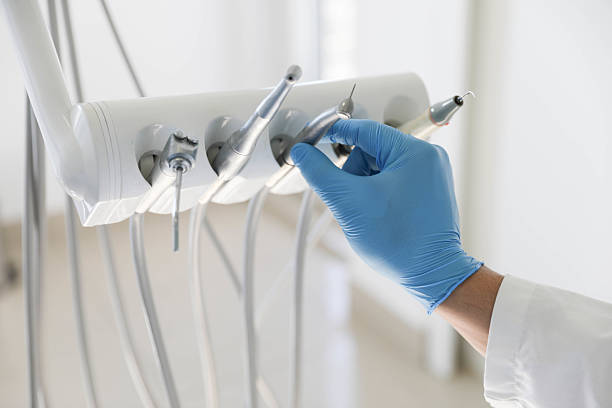 Professional Tooth Extraction technician working in Montvale, NJ